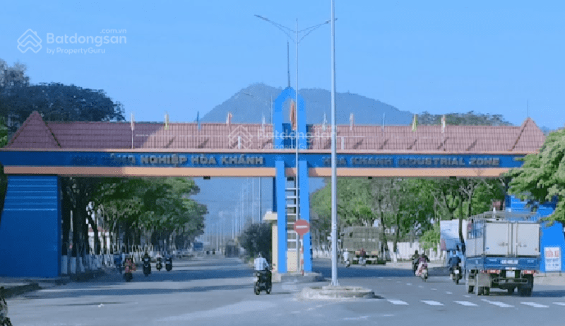 Hoa Khanh industrial park with trees bordering the road